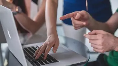 People providing tech support.