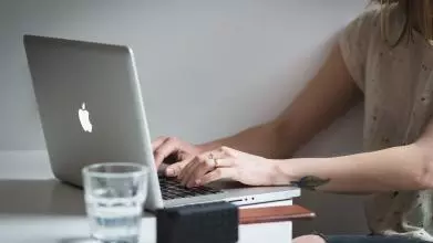 Woman sitting at her laptop
